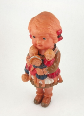Girl Carrying Dolls
