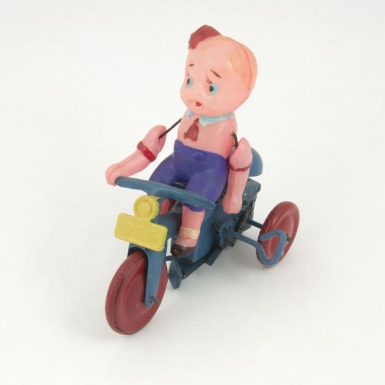 Boy on Tricycle