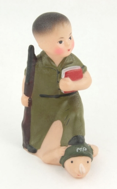 Communist Boy Standing on Military Policeman