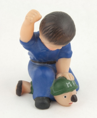 Communist Boy Beating Military Policeman
