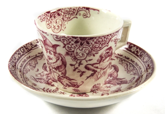 Punch & Judy Tea Cup With Saucer