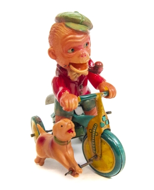Monkey on Tricycle with Dog