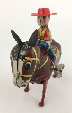 "Plodding Donkey with Cowboy"