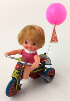 Girl on Tricycle