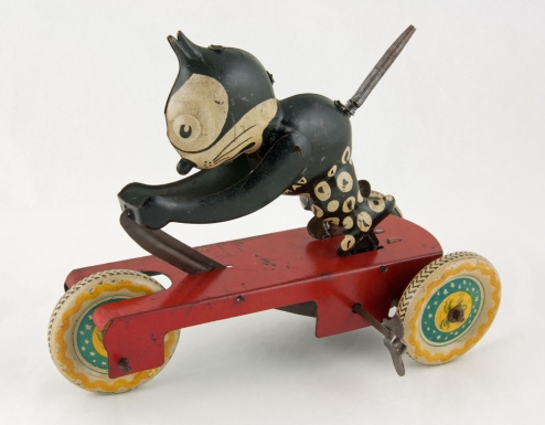 Felix the Cat Riding a Scooter