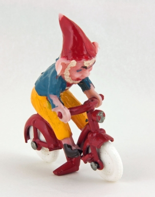 "Big Ears Riding his Bicycle"